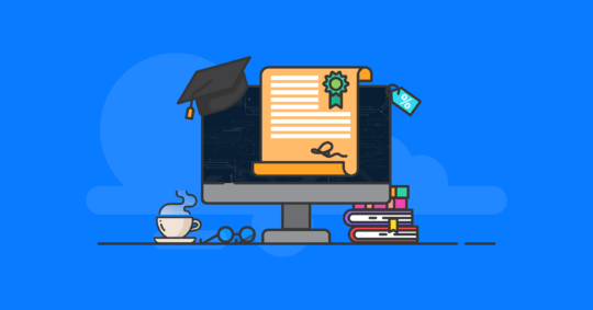 A very scholarly computer monitor. It is wearing a mortarboard hat and is surrounded by a diploma, a sale tag, a hot beverage, eyeglasses and books.